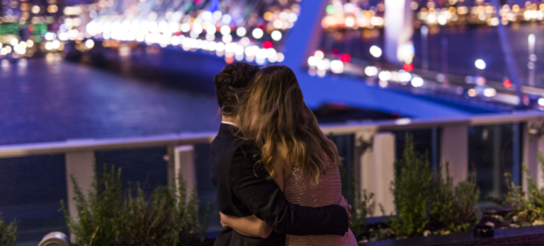 couple admiring skyline view from rooftop terrace of nhow hotel Rotterdam