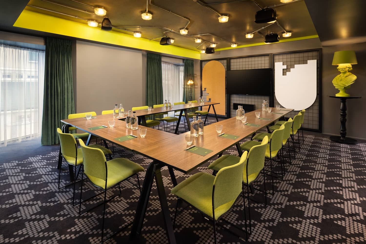 nhow_London_meeting_rooms_tech_lab_u_shape_chairs_flowers_tv_curtains_open_daytime_2 (1)