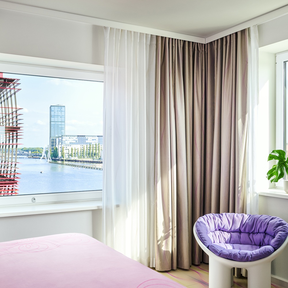 nhow_Berlin_Room_premium_curtains_open_king_size_bed_armchair_vi