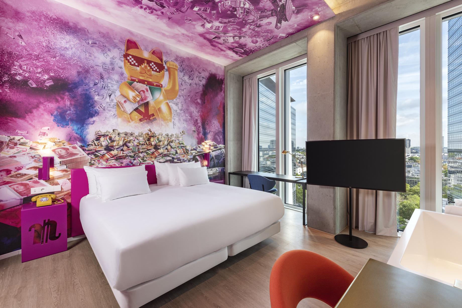 nhow_Frankfurt_Room_presidential_suite_curtains_open_king_size_bed_office_chair_armch