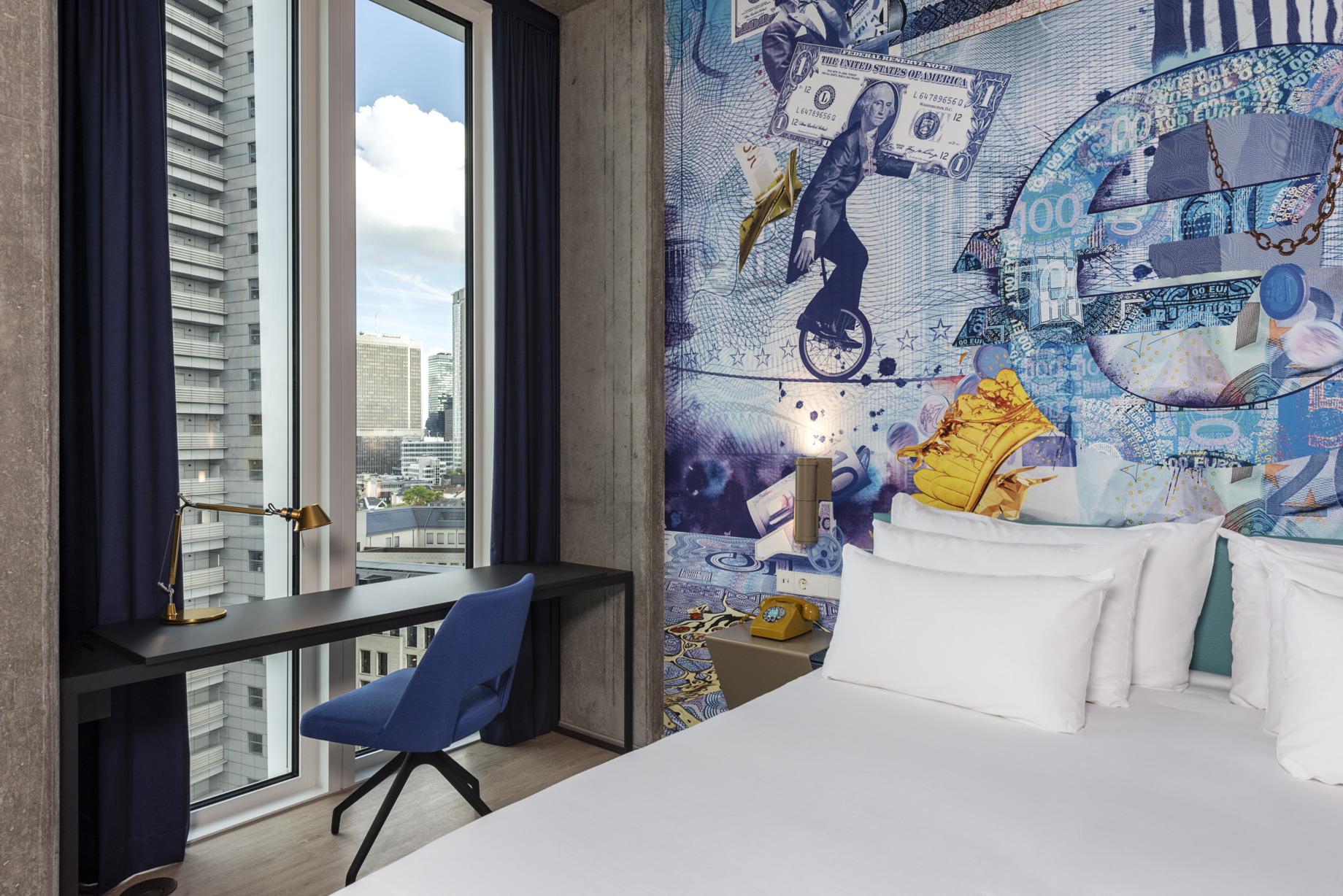 nhow_Frankfurt_Room_premium_curtains_open_king_size_bed_office_chair_lamp-1840x1228
